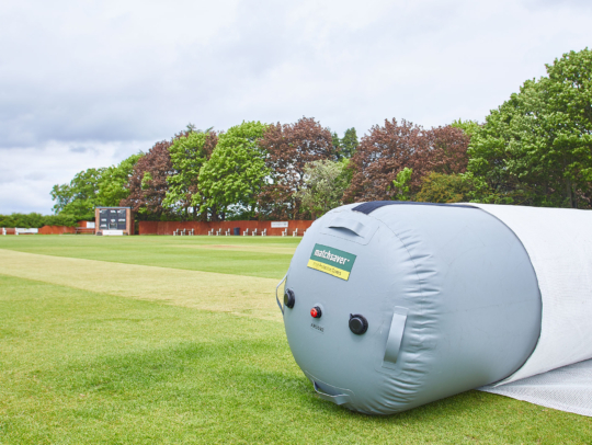 Matchsaver air roller pitch cover protecting a cricket pitch